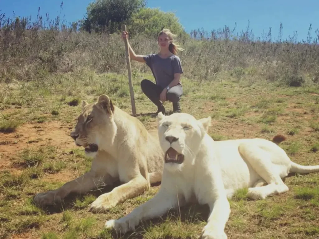 Melissa Cohen Biden, posing with some lionesses while on safari. Photo: Facebook